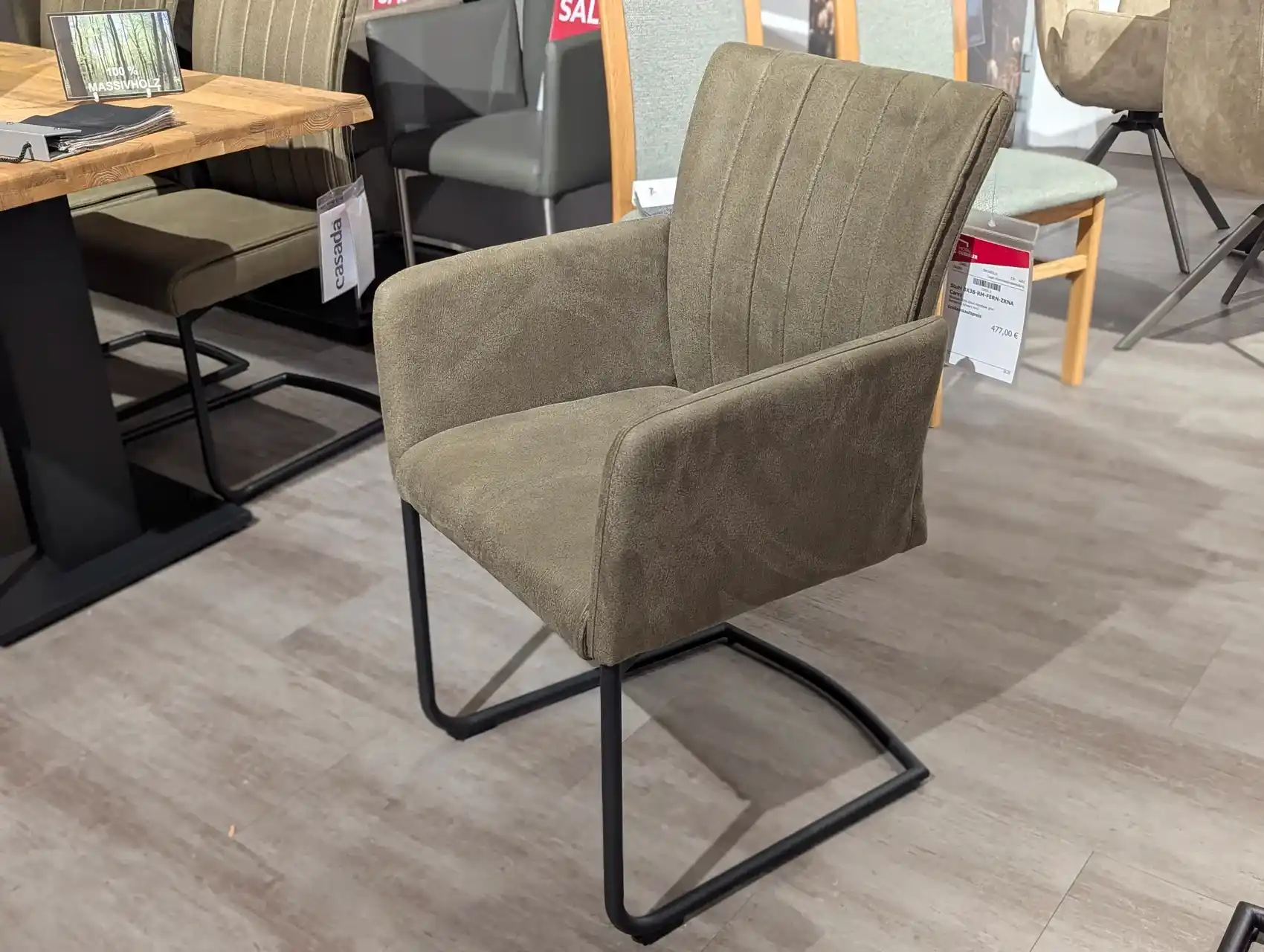 Grüner Stuhl mit Microfaser Bezug