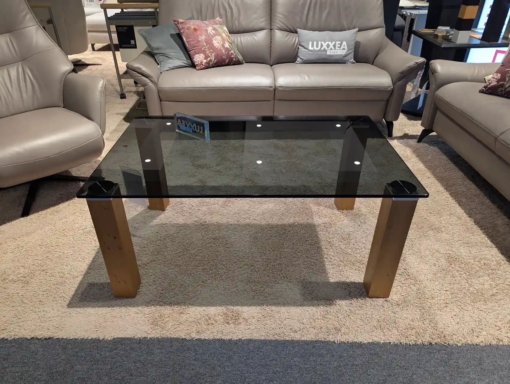 Couchtisch mit Rauchglas